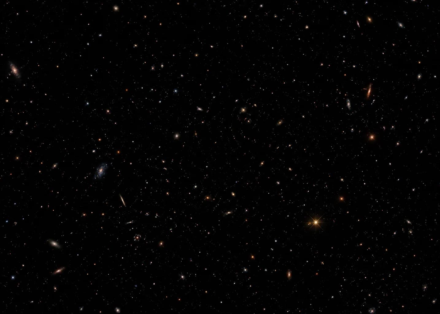 A deep-field exposure scattered with faint distant galaxies